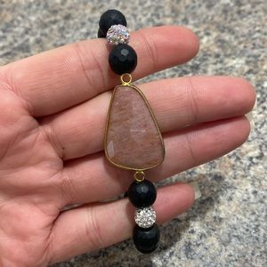 Erimish stretchy stone bracelet  . Pink stone with black and glittery beads